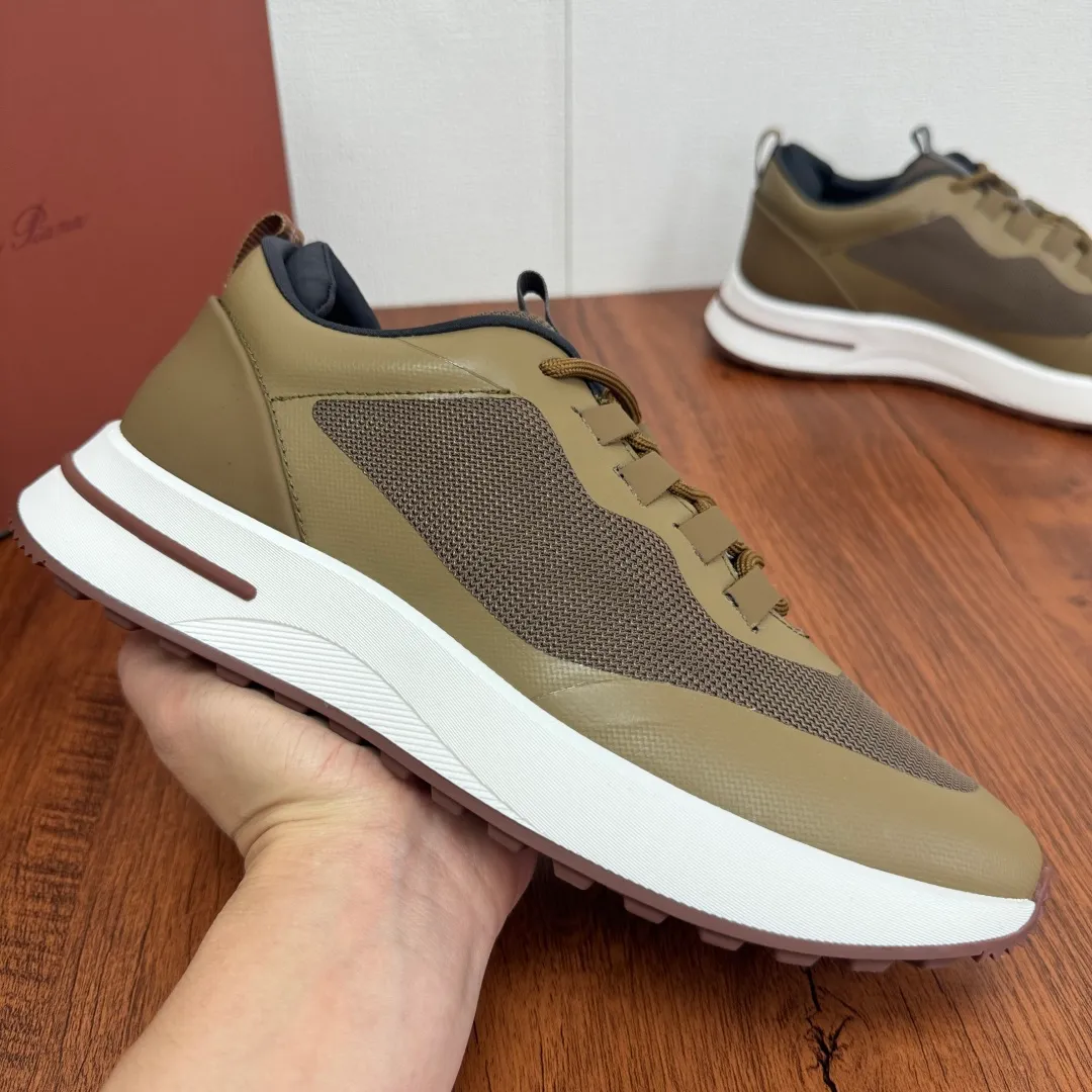Batch 760 Loro Piana mesh cowhide stitching casual sports men's shoes LP jogging shoes OEM original soles feel free to enter the counter! This casual shoe is knitted from Wind fiber, giving it a unique three-dimensional effect. The unique silhouette narrows slightly at the midsection and is embellished with nappa leather details. The lightweight rubber sole and studs on the edge enhance traction and stability, and functional details full of modern aesthetics add a sporty style to the shoe. The upper uses a hot-melt edge-sealing process. The lightweight technical material of the Kummel-colored rubber outsole is inlaid with cushioning pads on the inside of the sole to distribute the weight more evenly and reduce the load during walking. The leather eyelets are directly set on the upper fixed to the sole to ensure stability. The rear is equipped with cushioning pads to improve wearing comfort. The full package of the counter comes with a shoelace insole. Multiple colors available! Fabric: 100% nylon Decoration: 100% cow leather Accessories: 100% polyurethane Size: 39-40-41-42-43-44 Standard leather shoe size (38/45 can be customized and returns and exchanges are not supported) Item number: FAM1718 brown green